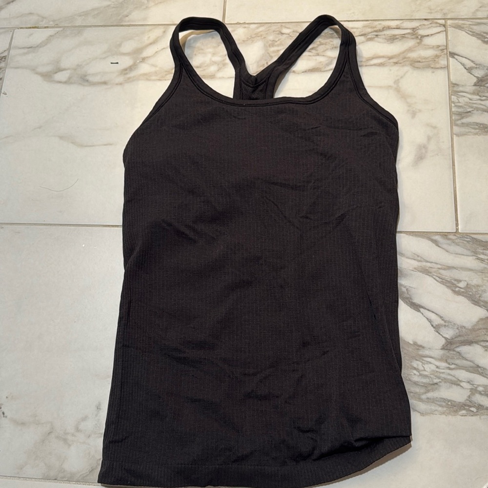 Lululemon Ebb to street tank top light support 
Size 10 
Color black